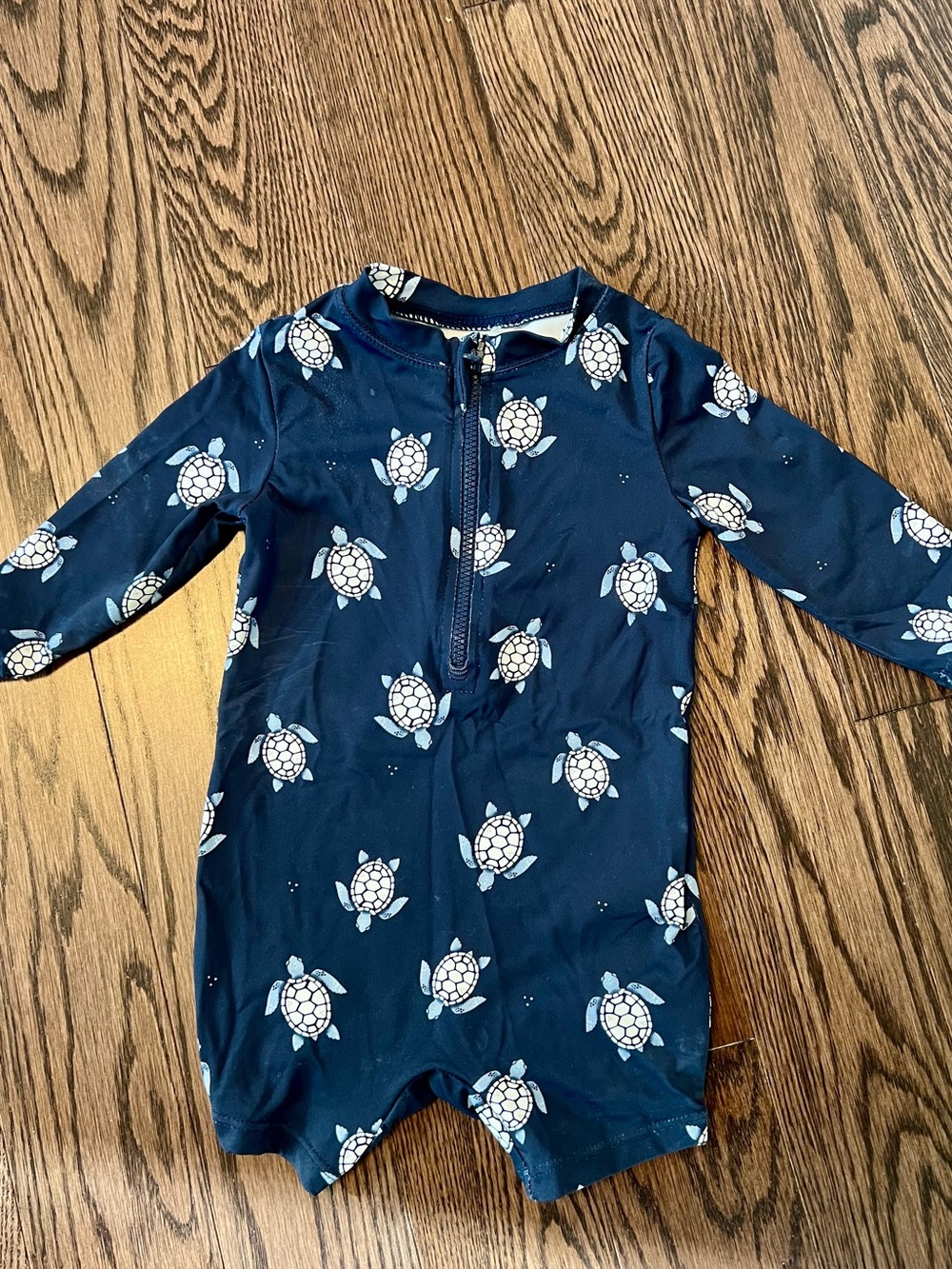 Petit Lem Navy and White Turtle Print One-Piece